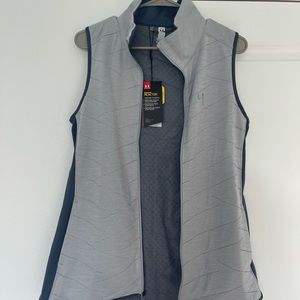 New w/ tags. Women’s Under Armour Vest Small.